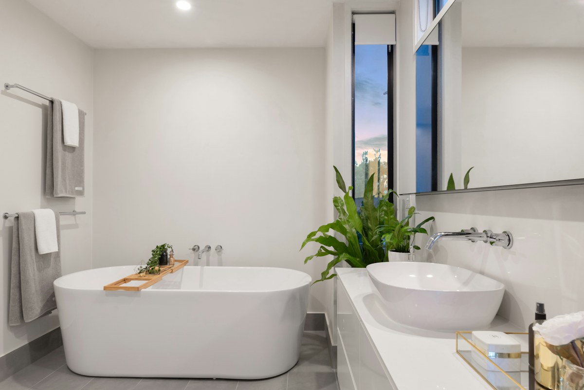 Bright contemporary bathroom with clean tiled surfaces